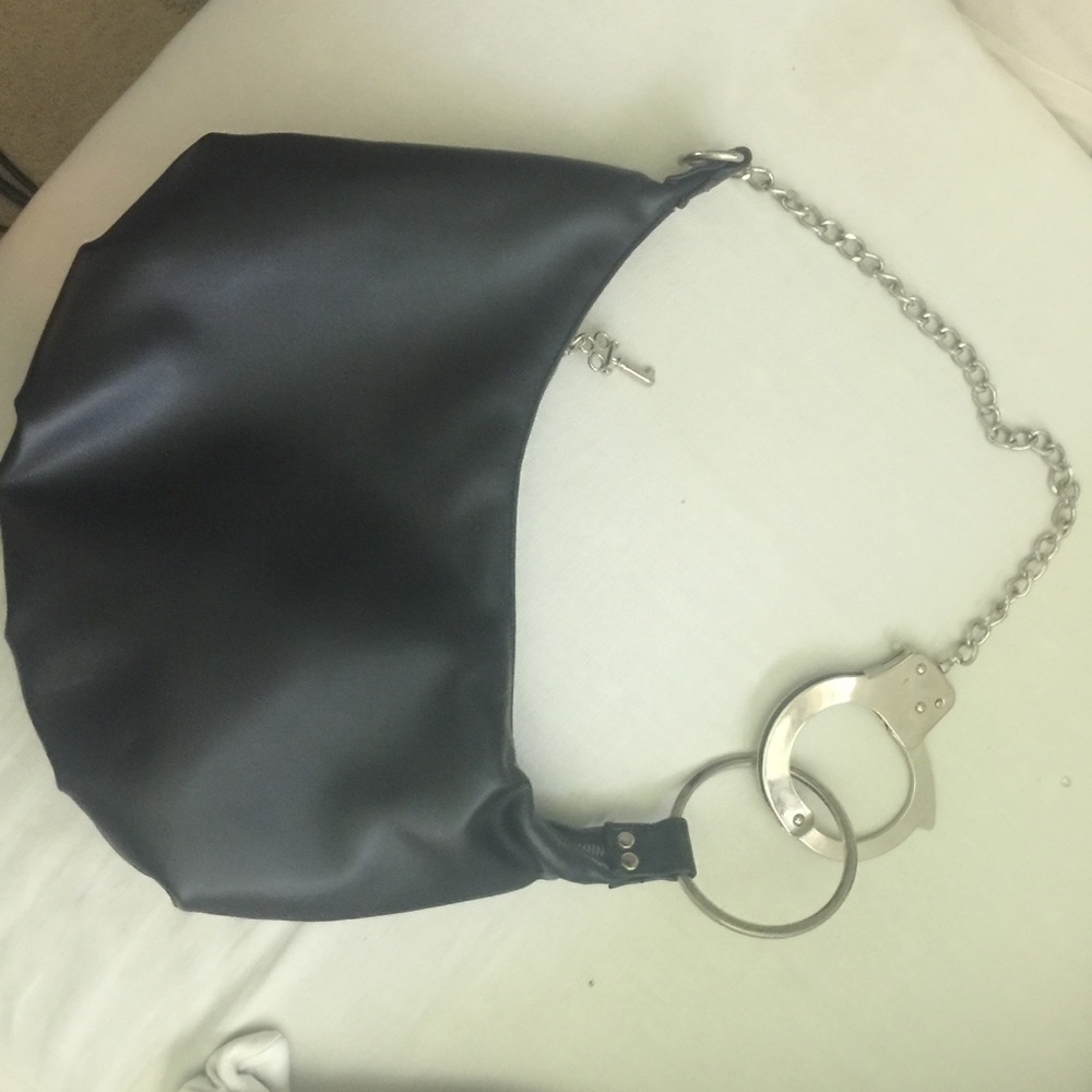 Handcuff handbag
